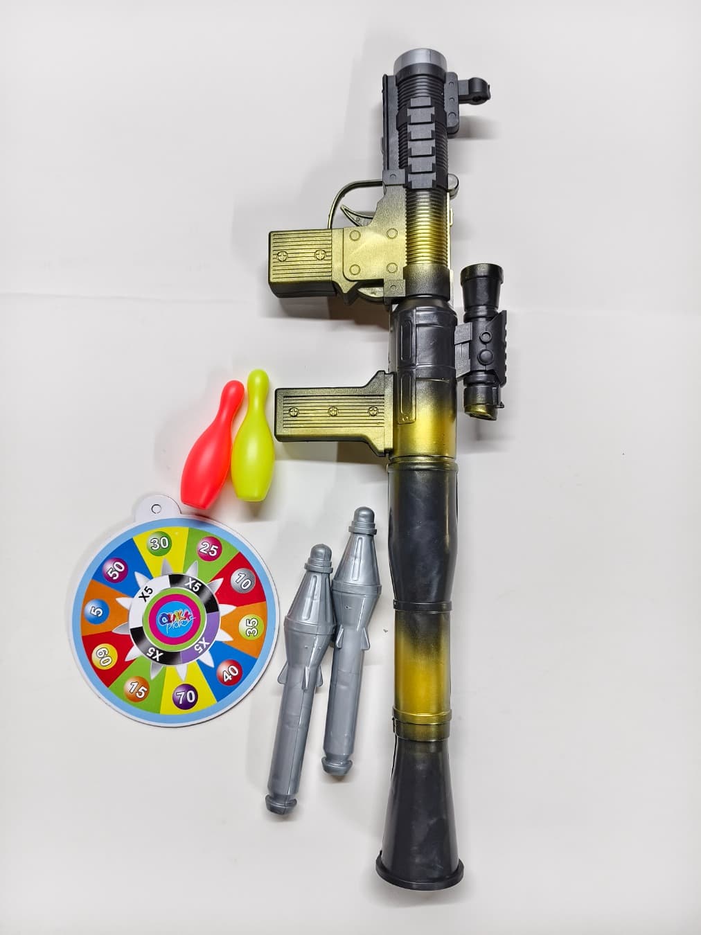 Spray painted rocket launcher with bowling ball target