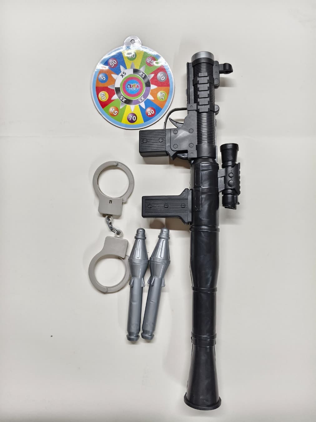 Solid color rocket launcher with handcuff target